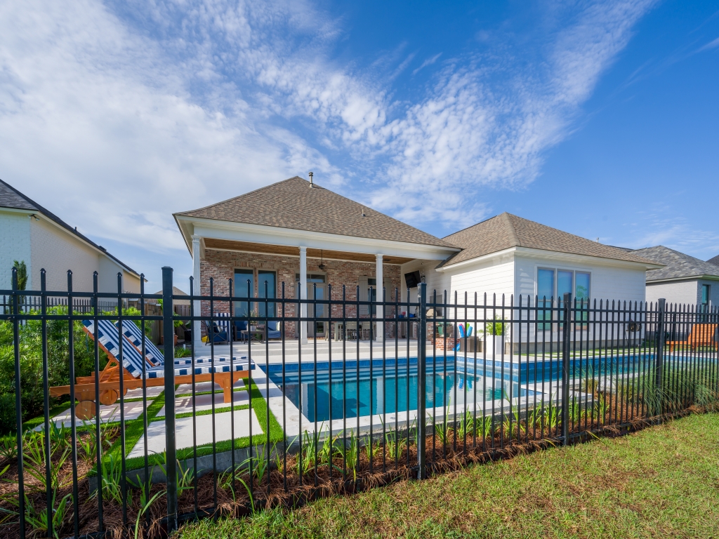 Black ornamental aluminum fence installed at a new construction home in Baton Rouge, Louisiana