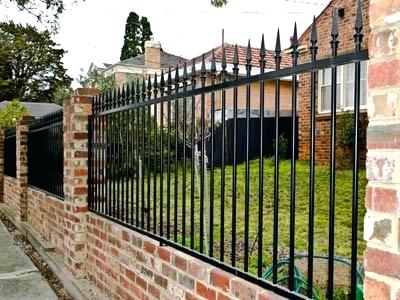 Iron Fence with Brick Wall